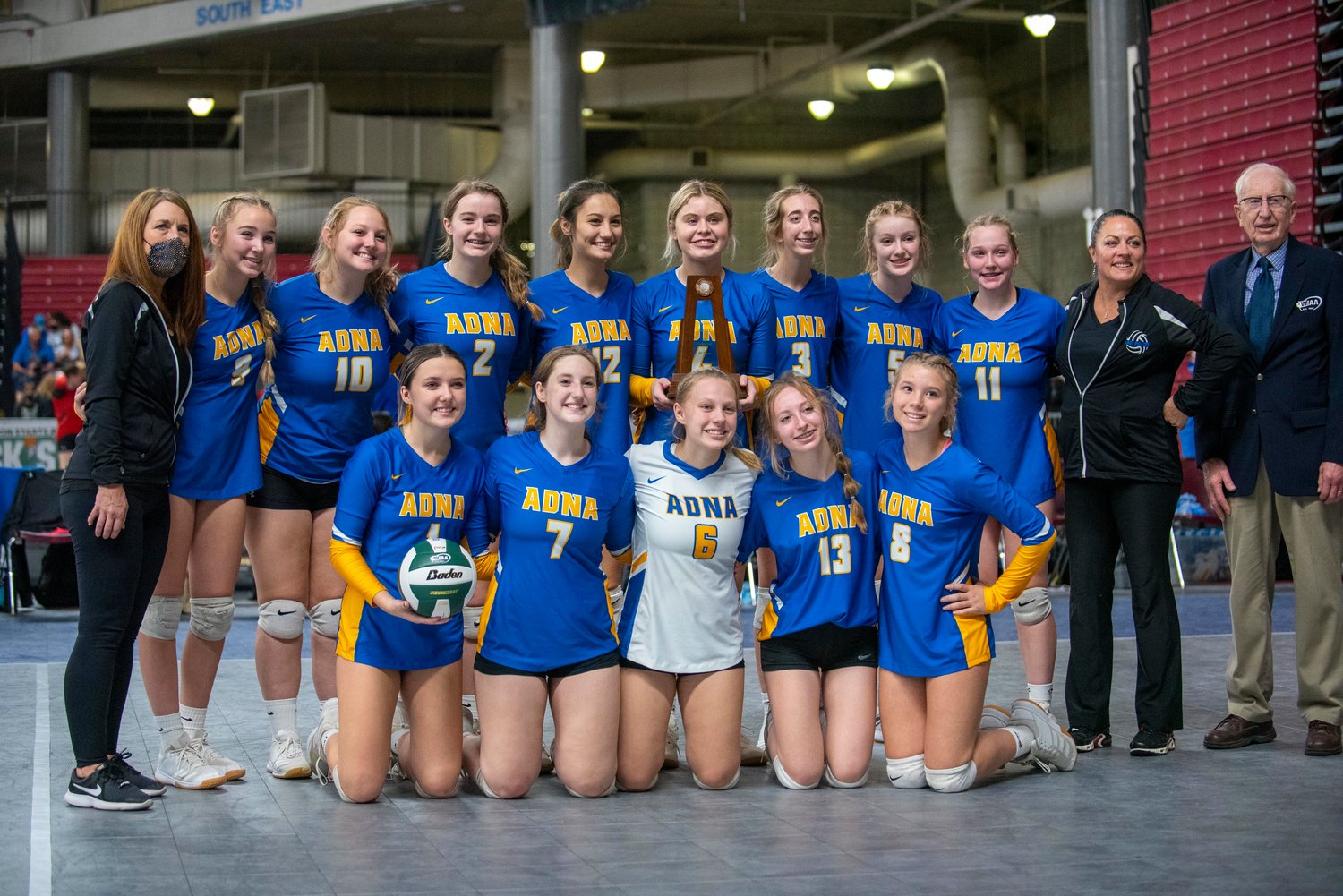 Adna poses with the 8th-place trophy at the 2B state voleyball tournament Friday in Yakima.